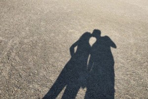 Shadow Of Couple Kissing On Road
